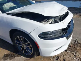2019 Dodge Charger SXT with VIN 2C3CDXJGXKH533322, listed as a IAAI auction lot 41808838 with 95,877 mi miles and . Bid and sale history available at DreamBid. Image 19.