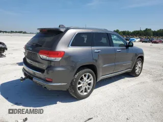 2014 Jeep Grand Cherokee Summit with VIN 1C4RJFJGXEC159438, listed as a Copart auction lot 50864595 with 134,558 mi miles and Salvage title. Bid and sale history available at DreamBid. Image 3.