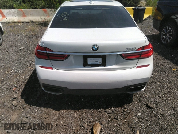 2017 BMW 7 Series 750i with VIN WBA7F0C35HGM21649, listed as a IAAI auction lot 37362691 with 10,000 mi miles and . Bid and sale history available at DreamBid. Image 16.