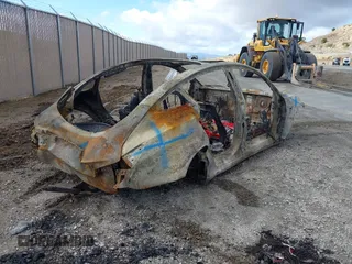 2018 Tesla Model 3 Long Range Battery with VIN 5YJ3E1EB5JF100466, listed as a IAAI auction lot 41413723 with Not Provided miles and . Bid and sale history available at DreamBid. Image 4.