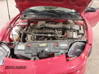 1999 Pontiac Sunfire SE z VIN 1G2JB524XX7547651, wystawiony jako IAAI lot #41962158 z przebiegiem 130 385 mil mil oraz . Historia ofert i sprzedaży dostępna na DreamBid. Obrazek 10.