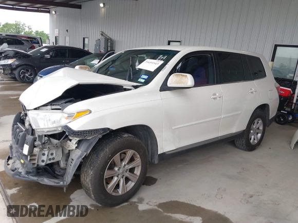 2013 Toyota Highlander with VIN 5TDZA3EH1DS037033, listed as a IAAI auction lot 39453343 with 163,149 mi miles and . Bid and sale history available at DreamBid. Image 2.