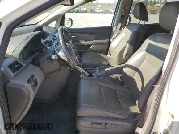 2016 Honda Odyssey Touring Elite with VIN 5FNRL5H9XGB006981, listed as a Copart auction lot 63970385 with 165,164 mi miles and Salvage title. Bid and sale history available at DreamBid. Image 7.
