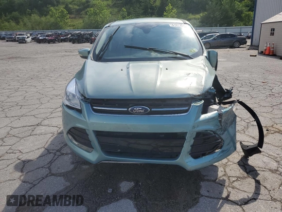 2013 Ford Escape SEL z VIN 1FMCU9H98DUC56048, wystawiony jako Copart lot #61613085 z przebiegiem 198 102 mil mil oraz Szkoda całkowita • Salvage title. Historia ofert i sprzedaży dostępna na DreamBid. Obrazek 5.