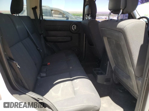 2011 Dodge Nitro Heat z VIN 1D4PT4GK0BW589252, wystawiony jako Copart lot #56869875 z przebiegiem 136 306 mil mil oraz Szkoda całkowita • Salvage title. Historia ofert i sprzedaży dostępna na DreamBid. Obrazek 10.