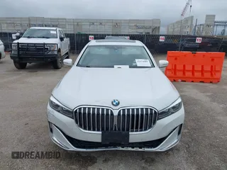 2020 BMW 7 Series 740i z VIN WBA7T2C07LCE11573, wystawiony jako IAAI lot #42474689 z przebiegiem 63 015 mil mil oraz . Historia ofert i sprzedaży dostępna na DreamBid. Obrazek 12.