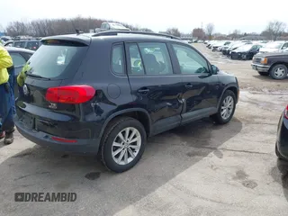2018 Volkswagen Tiguan with VIN WVGBV7AX3JK002325, listed as a IAAI auction lot 41960059 with 57,619 mi miles and . Bid and sale history available at DreamBid. Image 4.