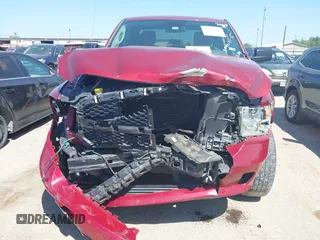 2014 Ram 1500 Express z VIN 1C6RR6FT3ES122128, wystawiony jako IAAI lot #41994152 z przebiegiem 138 624 mil mil oraz . Historia ofert i sprzedaży dostępna na DreamBid. Obrazek 6.