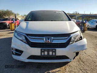 2020 Honda Odyssey Touring with VIN 5FNRL6H8XLB007622, listed as a Copart auction lot 76297494 with 83,452 mi miles and Salvage Title. Bid and sale history available at DreamBid. Image 5.