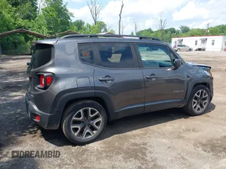2017 Jeep Renegade Latitude z VIN ZACCJABB6HPG36670, wystawiony jako IAAI lot #42474479 z przebiegiem 154 536 mil mil oraz . Historia ofert i sprzedaży dostępna na DreamBid. Obrazek 13.