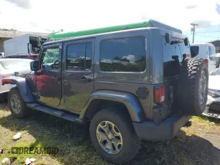2014 Jeep Wrangler Unlimited Rubicon with VIN 1C4HJWFG7EL302897, listed as a Copart auction lot 48969425 with 57,976 mi miles and Salvage title. Bid and sale history available at DreamBid. Image 2.