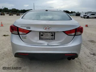 2013 Hyundai Elantra Coupe GS PZEV with VIN KMHDH6AE5DU003333, listed as a Copart auction lot 69174074 with 128,797 mi miles and Salvage Title. Bid and sale history available at carsss.com. Image 6.