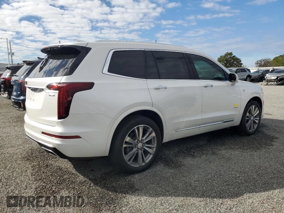 2021 Cadillac XT6 Premium Luxury z VIN 1GYKPCRSXMZ230618, wystawiony jako Copart lot #81022824 z przebiegiem Nie podano mil oraz Szkoda całkowita • Salvage title. Historia ofert i sprzedaży dostępna na DreamBid. Obrazek 3.