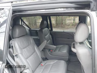 2010 Honda Odyssey EX-L with VIN 5FNRL3H75AB021480, listed as a IAAI auction lot 41793994 with 169,386 mi miles and . Bid and sale history available at DreamBid. Image 8.