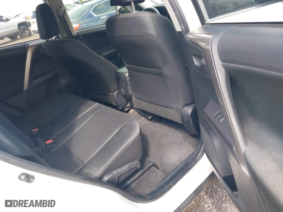 2018 Toyota RAV4 LE with VIN JTMZFREV9JJ192075, listed as a IAAI auction lot 41860513 with 64,586 mi miles. Bid and sale history available at carsss.com. Image 8.