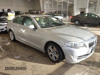 2012 BMW 5 Series 528i xDrive with VIN WBAXH5C5XCDW09327, listed as a IAAI auction lot 41644876 with 152,851 mi miles. Bid and sale history available at carsss.com. Image 1.