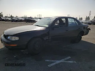 1992 Toyota Camry z VIN JT2VK12E2N0003464, wystawiony jako Copart lot #83446264 z przebiegiem 181 876 mil mil oraz Szkoda całkowita • Salvage title. Historia ofert i sprzedaży dostępna na DreamBid. Obrazek 1.