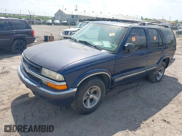 1999 Chevrolet Blazer LS z VIN 1GNCS13W1X2120019, wystawiony jako IAAI lot #41766379 z przebiegiem Nie podano mil oraz . Historia ofert i sprzedaży dostępna na DreamBid. Obrazek 2.
