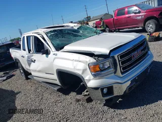 2014 GMC Sierra 1500 SLT with VIN 3GTU2VEC5EG507541, listed as a IAAI auction lot 42355428 with 58,102 mi miles and . Bid and sale history available at DreamBid. Image 1.