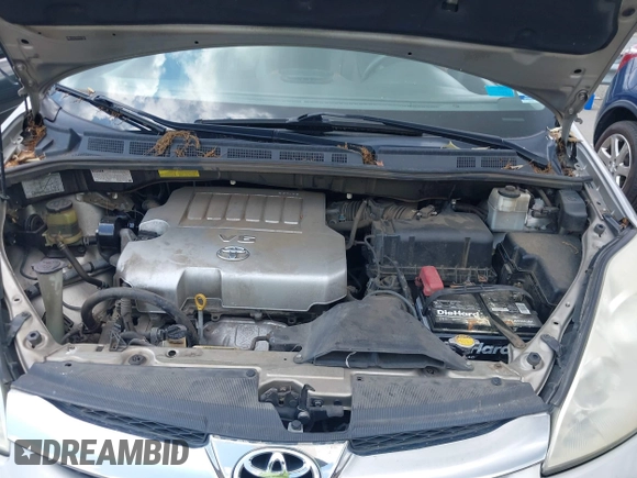 2009 Toyota Sienna XLE z VIN 5TDZK22C89S271855, wystawiony jako IAAI lot #42752540 z przebiegiem 168 909 mil mil oraz . Historia ofert i sprzedaży dostępna na DreamBid. Obrazek 10.