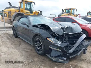 2021 Ford Mustang EcoBoost z VIN 1FATP8UH2M5120226, wystawiony jako IAAI lot #42164009 z przebiegiem 85 571 mil mil oraz . Historia ofert i sprzedaży dostępna na DreamBid. Obrazek 1.