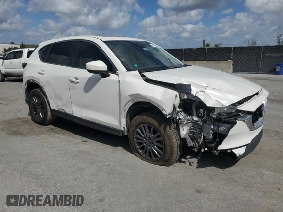 2019 Mazda CX-5 Touring with VIN JM3KFACM5K0693931, listed as a Copart auction lot 51599685 with 51,907 mi miles and Non Repairable. Bid and sale history available at carsss.com. Image 4.