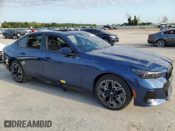 2024 BMW i5 eDrive40 with VIN WBY33FK00RCR76973, listed as a Copart auction lot 67562934 with 4,315 mi miles and Salvage Title. Bid and sale history available at carsss.com. Image 4.