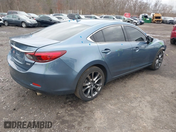 2017 Mazda 6 Grand Touring with VIN JM1GL1X52H1109210, listed as a IAAI auction lot 41738041 with 127,585 mi miles. Bid and sale history available at carsss.com. Image 4.