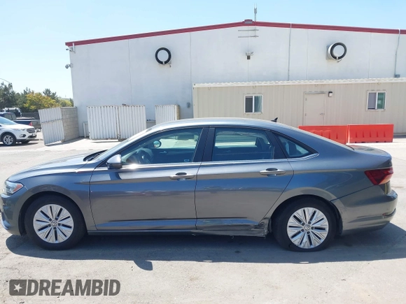 2019 Volkswagen Jetta S z VIN 3VWC57BUXKM074708, wystawiony jako IAAI lot #42151448 z przebiegiem 189 430 mil mil oraz . Historia ofert i sprzedaży dostępna na DreamBid. Obrazek 14.