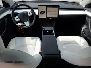 2023 Tesla Model 3 z VIN 5YJ3E1EA0PF677471, wystawiony jako Copart lot #57661625 z przebiegiem 20 326 mil mil oraz Szkoda całkowita • Salvage title. Historia ofert i sprzedaży dostępna na DreamBid. Obrazek 8.