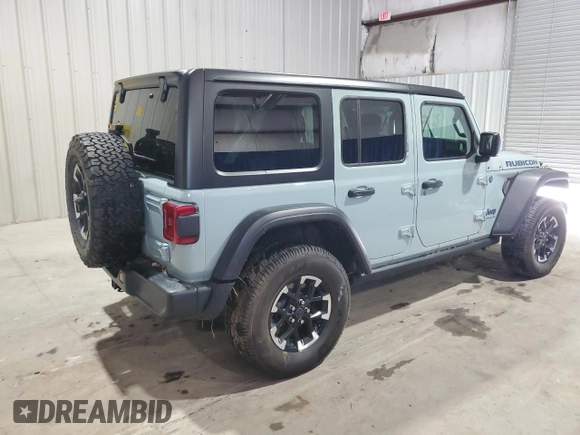2024 Jeep Wrangler Rubicon with VIN 1C4RJXR67RW293197, listed as a Copart auction lot 59886995 with Not provided miles and Salvage title. Bid and sale history available at DreamBid. Image 3.