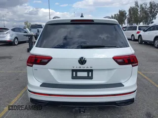 2023 Volkswagen Tiguan SE R-Line Black with VIN 3VVCB7AX3PM133002, listed as a IAAI auction lot 41902721 with 32,915 mi miles and . Bid and sale history available at DreamBid. Image 16.