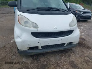 2008 Smart fortwo Pure z VIN WMEEJ31X78K128768, wystawiony jako IAAI lot #42367188 z przebiegiem 108 111 mil mil oraz . Historia ofert i sprzedaży dostępna na DreamBid. Obrazek 6.