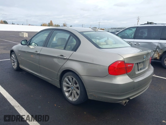 2011 BMW 3 Series 328i with VIN WBAPH5C57BA443932, listed as a IAAI auction lot 40832127 with 206,426 mi miles and . Bid and sale history available at carsss.com. Image 3.
