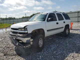 2004 Chevrolet Tahoe LS with VIN 1GNEC13V84R288076, listed as a Copart auction lot 58320985 with 263,726 mi miles and Salvage title. Bid and sale history available at DreamBid. Image 1.