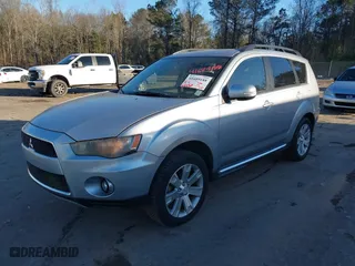2010 Mitsubishi Outlander SE with VIN JA4AS3AW4AZ009939, listed as a IAAI auction lot 41689188 with 144,480 mi miles. Bid and sale history available at carsss.com. Image 2.