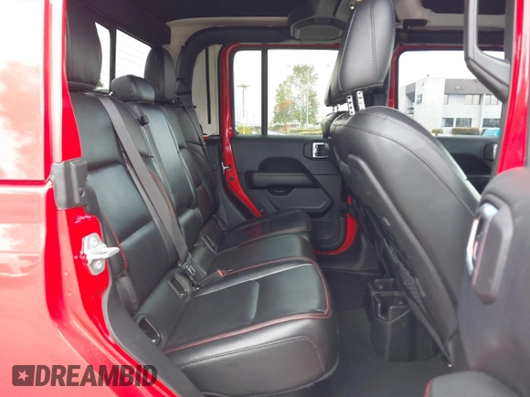 2021 Jeep Gladiator Rubicon with VIN 1C6JJTBGXML572976, listed as a IAAI auction lot 42134909 with 35,612 mi miles and . Bid and sale history available at DreamBid. Image 8.