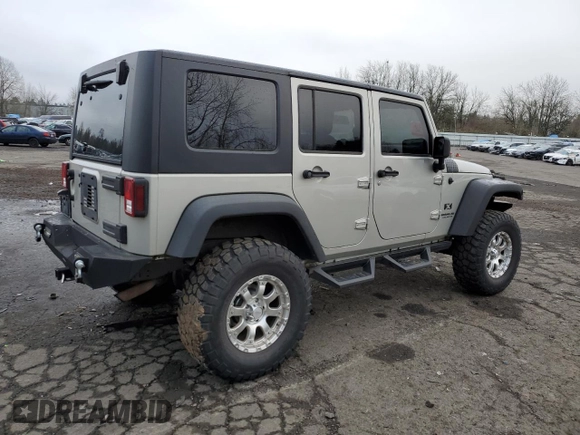 2007 Jeep Wrangler Unlimited X with VIN 1J4GA39177L105582, listed as a Copart auction lot 88912935 with 156,156 mi miles and Salvage Title. Bid and sale history available at DreamBid. Image 3.