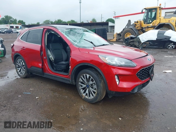 2020 Ford Escape Titanium with VIN 1FMCU9J9XLUA99423, listed as a IAAI auction lot 42511937 with 17,849 mi miles and . Bid and sale history available at DreamBid. Image 1.
