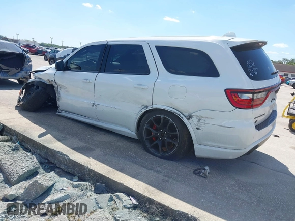 2021 Dodge Durango SRT 392 with VIN 1C4SDJGJ8MC724105, listed as a IAAI auction lot 41883925 with 31,184 mi miles and . Bid and sale history available at DreamBid. Image 3.