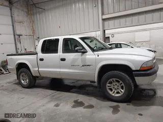 2001 Dodge Dakota Sport with VIN 1B7HG2AN31S229220, listed as a IAAI auction lot 42100843 with 134,034 mi miles. Bid and sale history available at carsss.com. Image 13.
