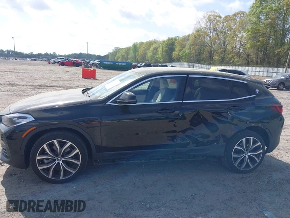 2022 BMW X2 sDrive28i z VIN WBXYH9C00N5U57853, wystawiony jako IAAI lot #41958326 z przebiegiem 49 518 mil mil oraz . Historia ofert i sprzedaży dostępna na DreamBid. Obrazek 14.