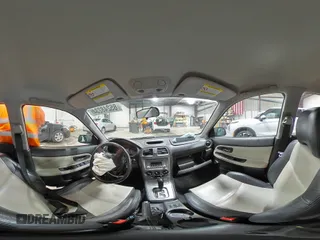 2005 Saab 9-2X Linear z VIN JF4GG61635H056242, wystawiony jako Copart lot #85248234 z przebiegiem 118 183 mil mil oraz Szkody całkowita. Historia ofert i sprzedaży dostępna na DreamBid. Obrazek 13.