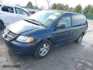 2007 Dodge Grand Caravan SXT with VIN 2D4GP44L37R356984, listed as a IAAI auction lot 41475361 with 153,843 mi miles. Bid and sale history available at carsss.com. Image 2.