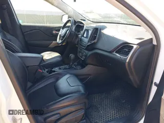 2019 Jeep Cherokee Latitude Plus with VIN 1C4PJMLB8KD112699, listed as a IAAI auction lot 42166892 with 128,396 mi miles and . Bid and sale history available at DreamBid. Image 5.