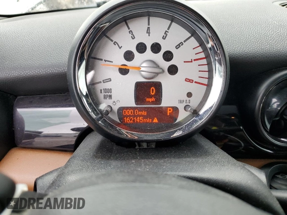 2011 MINI Hardtop S with VIN WMWSV3C56BTY15420, listed as a Copart auction lot 58050875 with 162,145 mi miles and Salvage title. Bid and sale history available at DreamBid. Image 9.