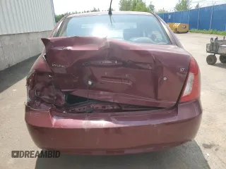 2006 Hyundai Accent GL z VIN KMHCN45C26U052459, wystawiony jako Copart lot #60089355 z przebiegiem 247 311 mil mil oraz Szkoda całkowita • Salvage title. Historia ofert i sprzedaży dostępna na DreamBid. Obrazek 6.
