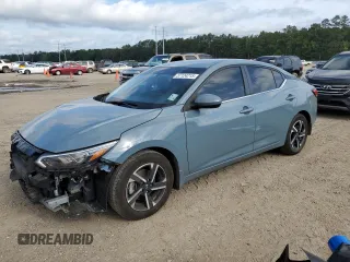 2024 Nissan Sentra SV z VIN 3N1AB8CV8RY322668, wystawiony jako Copart lot #57124215 z przebiegiem 22 188 mil mil oraz Szkoda całkowita • Salvage title. Historia ofert i sprzedaży dostępna na DreamBid. Obrazek 1.