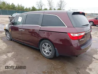 2011 Honda Odyssey EX-L with VIN 5FNRL5H64BB059576, listed as a IAAI auction lot 41903160 with 150,000 mi miles and . Bid and sale history available at carsss.com. Image 3.