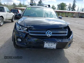 2012 Volkswagen Tiguan SE with VIN WVGBV7AX5CW561368, listed as a IAAI auction lot 42197389 with 63,809 mi miles and . Bid and sale history available at DreamBid. Image 6.